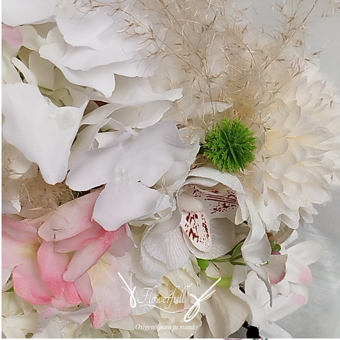 Floral bouquet of orchids and craspedia