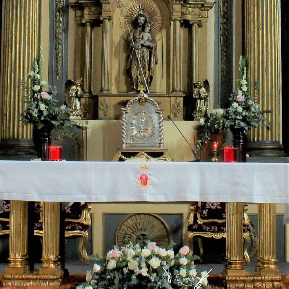 Low decoration in front of altar Church